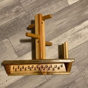 Bracelet, ring and necklace wall organizer.